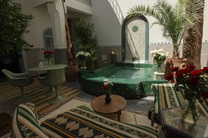 Green plunge pool patio at Riad La Tulipe, Marrakech